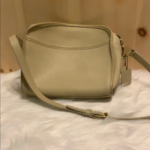 Coach cream-colored leather crossbody